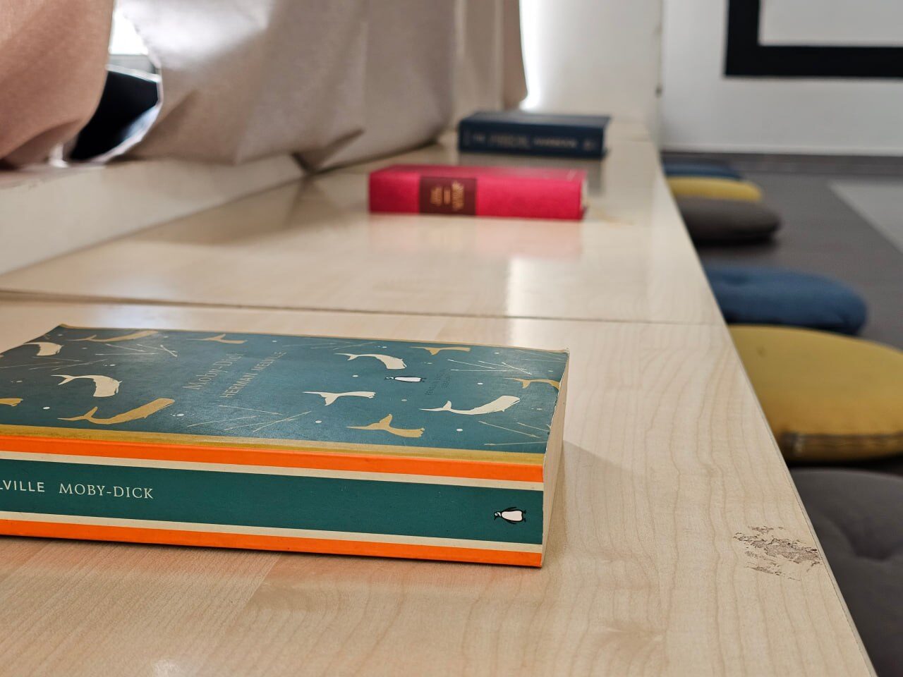 A copy of Moby-Dick on the window bench